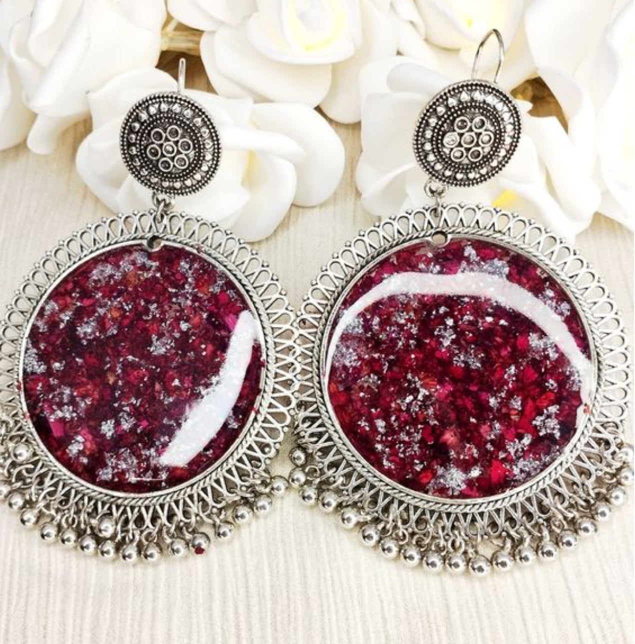 Resin jhumke with rose preservation