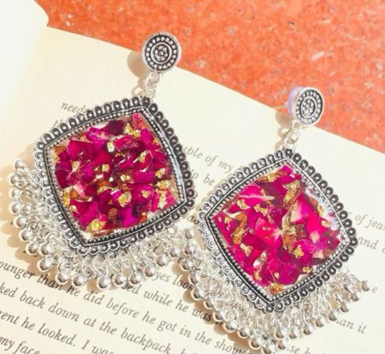 Resin jhumke with rose preservation