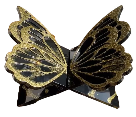 Resin butterfly bookstand with golden shimmer